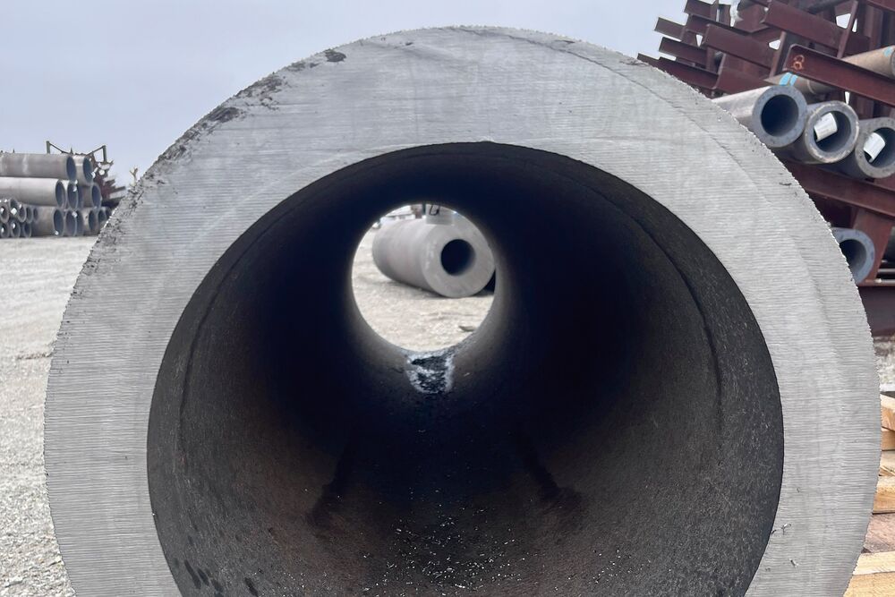 Thick cement pipe on work site Thick cement pipe on work site