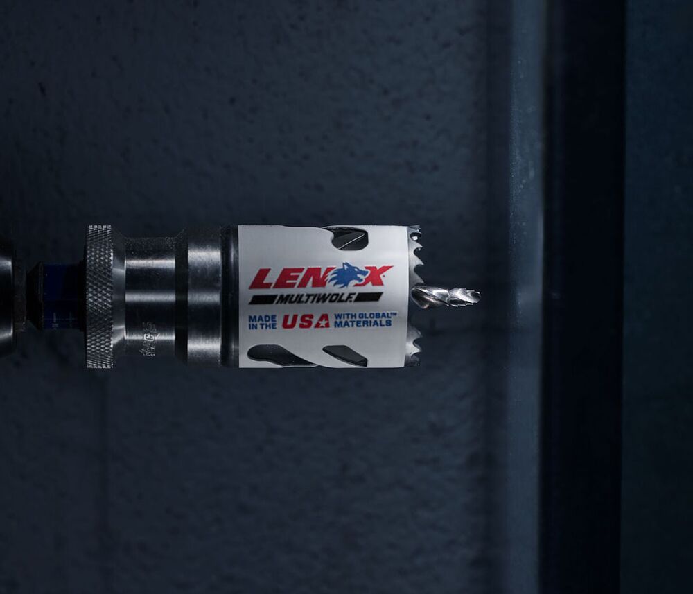 LENOX 2" SPEED SLOT Bi-Metal Hole Saw, SNAP-BACK Quick Change Arbor, and Step Bit Pilot Drill shown about to drill into metal" LENOX 2" SPEED SLOT Bi-Metal Hole Saw, SNAP-BACK Quick Change Arbor, and Step Bit Pilot Drill shown about to drill into metal"